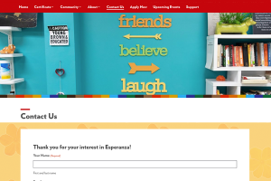 Screenshot of Esperanza website homepage shows logo of flowers and hands plus hero image shows bright colors of interior room reads in bright colors on turquoise walls: friends, believe, laugh and 'young, brown and educated'